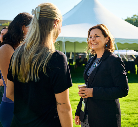 Passerini waving at attendees at her inauguration.